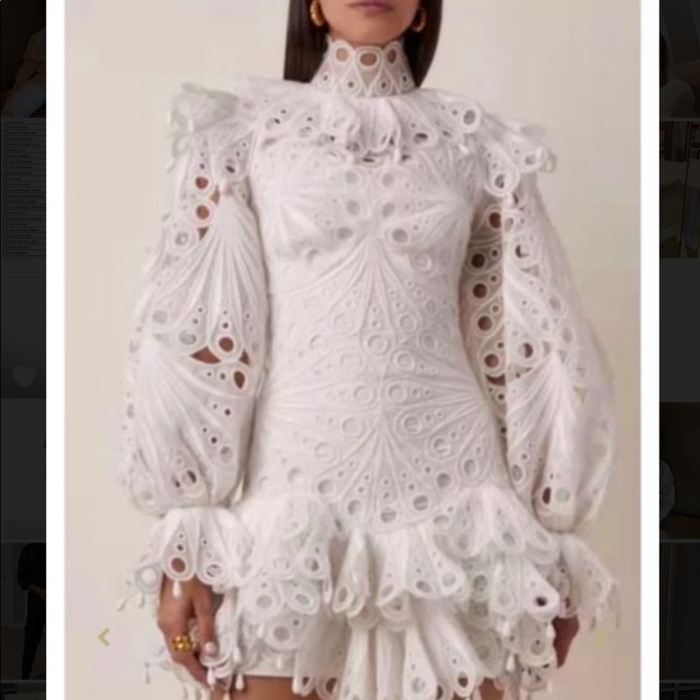 White ruffle dress long sleeve . Brand new never worn.